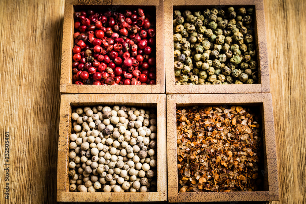 spices for a tasty meal on an old wooden table: red pepper, green pepper, black pepper, white pepper, ground chili, mixture of spices, salt
spices for a tasty meal on an old wooden table: red pepper, green pepper, black pepper, white pepper, ground chili, mixture of spices, salt