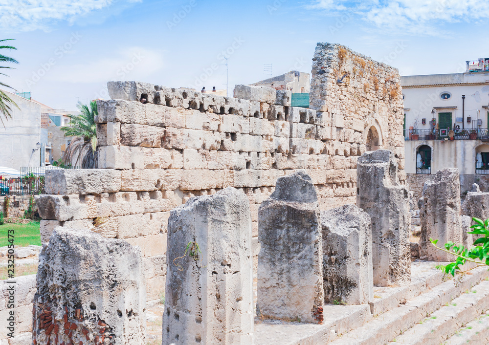 Ruins of temple of Apollo in Ortygia (Ortigia) Island, Syracuse, Sicily, Italy - ancient square 