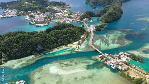 Aerial panoramic view of city of Koror, azure crystal clear water of western Pacific Ocean - landscape panorama of Micronesia from above, Koror Island, Palau photo