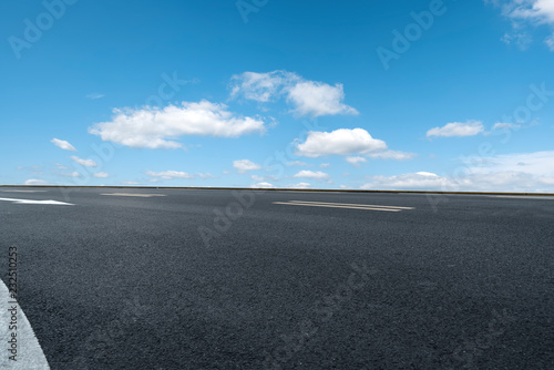Empty highway asphalt pavement and sky cloud landscape.. © 昊 周