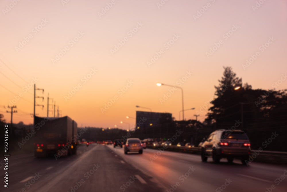 blur traffic on the road in thailand in nakhon ratchasima province with sunset light