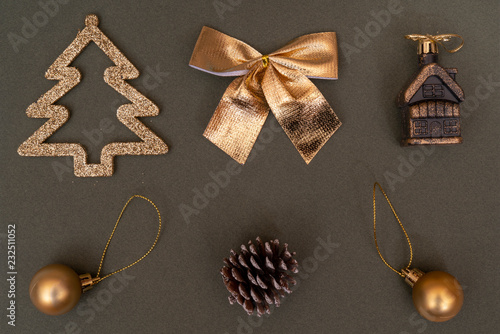 Golden Christmas tree decorations. Ball, bump, fir, bow.