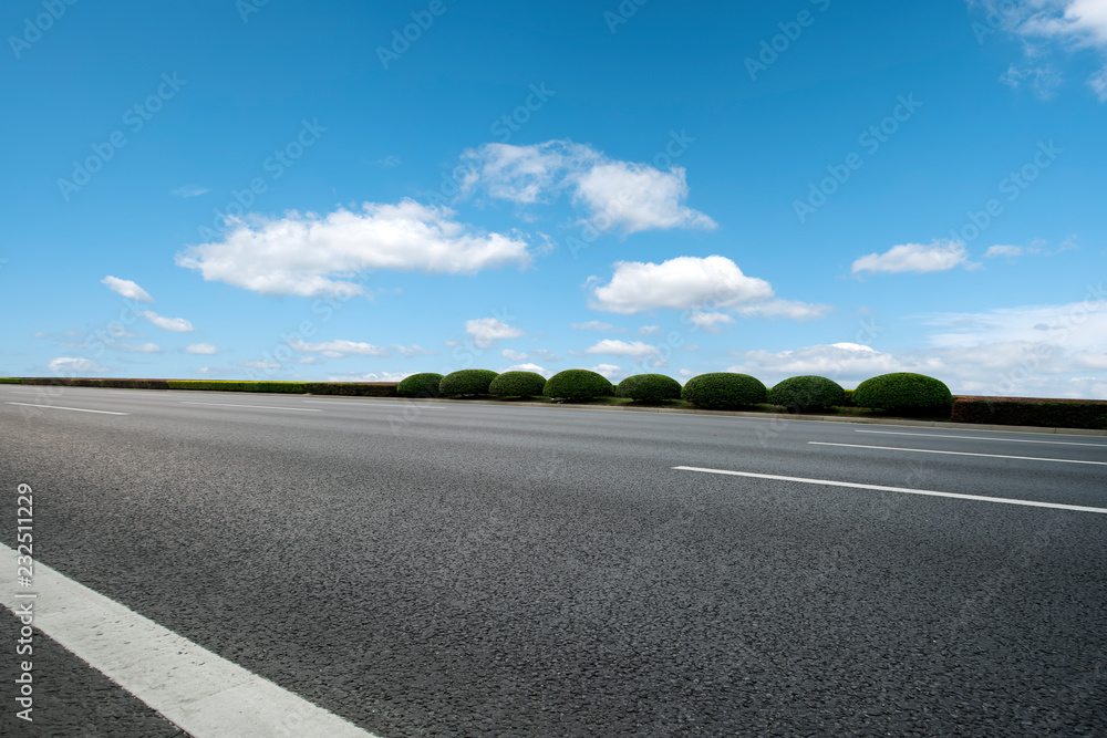 Fototapeta premium Empty highway asphalt pavement and sky cloud landscape..