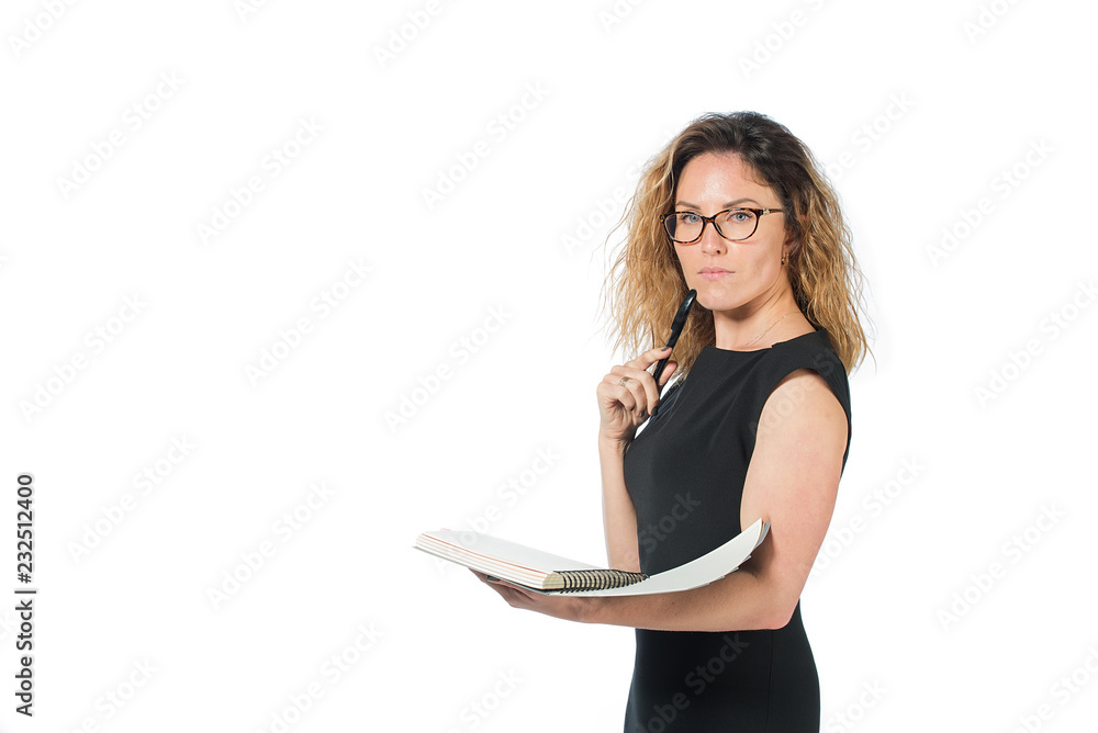 beautiful business woman in glasses in black dress on a white background. happy face. shows like. emotion of delight. holding a folder. checks report. makes an entry in the notebook. beautiful business woman in glasses in black dress on a white background. happy face. shows like. emotion of delight. holding a folder. checks report. makes an entry in the notebook.
