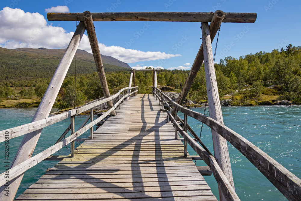 Traditional wooden bridge over the River Sjoa Traditional wooden bridge over the River Sjoa