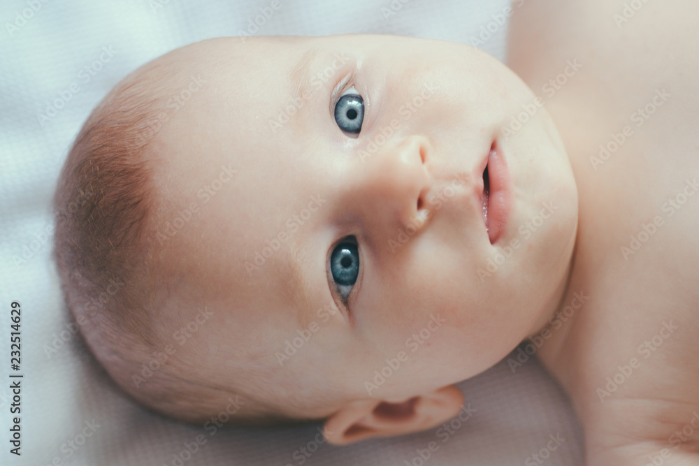Adorable features. Newborn baby girl or boy. Newborn baby with soft skin. Skin care for happy baby. Delicacy of features. Cute and happy Adorable features. Newborn baby girl or boy. Newborn baby with soft skin. Skin care for happy baby. Delicacy of features. Cute and happy