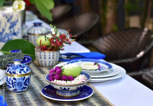 Traditional Thai utensils in contemporary table setting outdoor during day time, Thai fine dining 