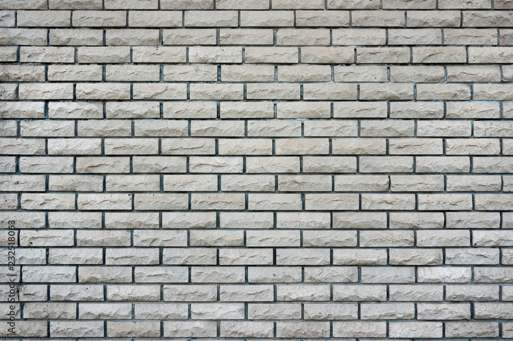 Wall of decorative natural brickwork.