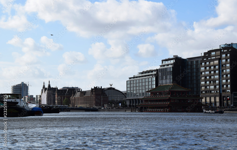 Fototapeta premium Canals in Amsterdam - Holland, the Netherlands