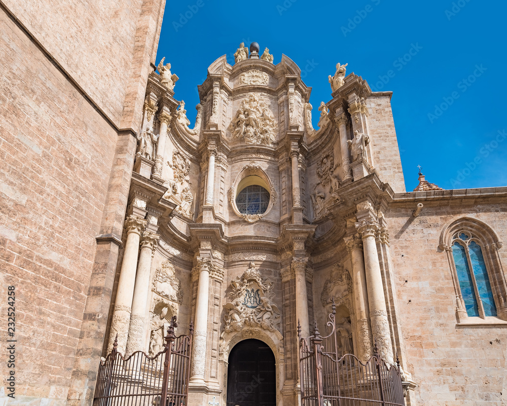 Facade and gate of the Basilica of the Assumption of Our Lady of Valencia, Spain (Saint Mary's Cathedral or Valencia Cathedral).Known as 