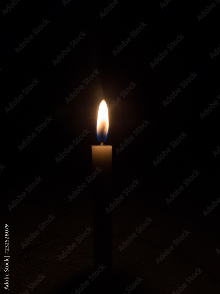A Candle flame in the dark 