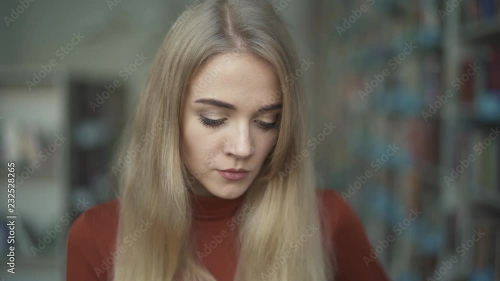 Cute girl shows anger while looking into the camera Cute girl shows anger while looking into the camera