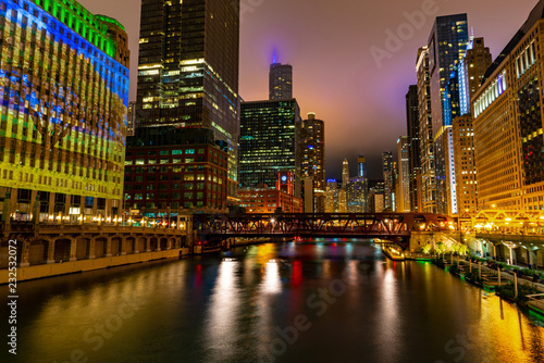 Chicago skyscrapers at twilight with reflection in river, Chicago IL 2018