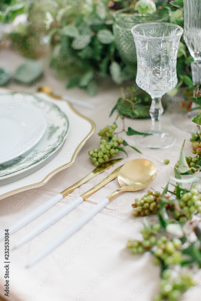 Gold silverware on table Gold silverware on table