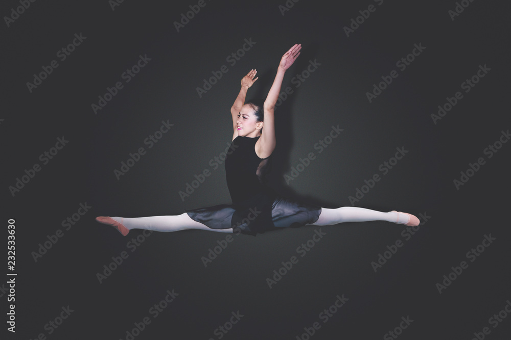 Young ballerina doing elegant dances