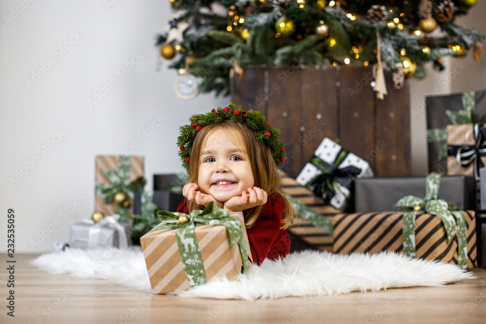 happy baby girl with christmas gifts on holidays eve happy baby girl with christmas gifts on holidays eve