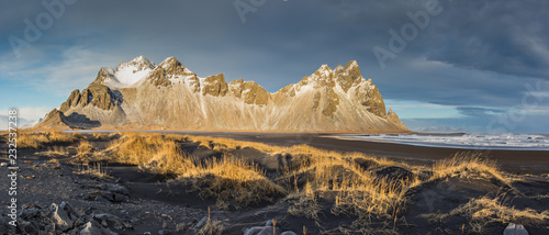 Vestrahorn mountains with dramatic sky with clouds, Iceland photo