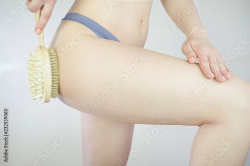 Girl cares for the skin. Get rid of cellulite.