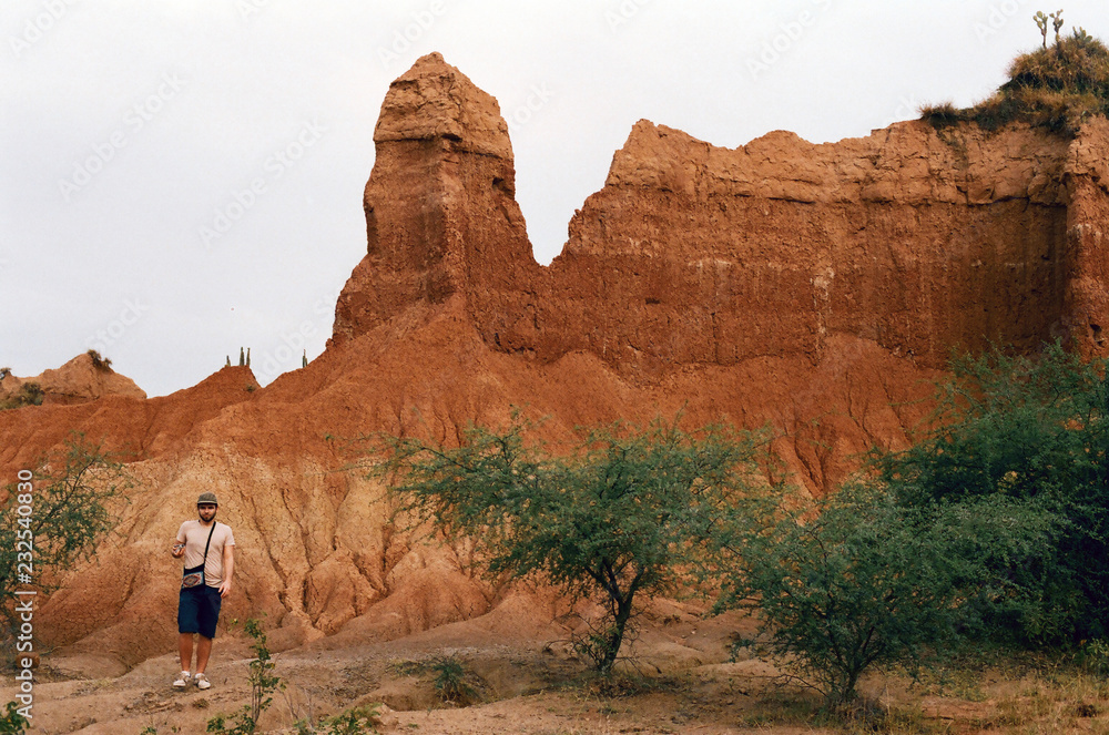 Tourist explores desert Tatacoa in Colombia Tourist explores desert Tatacoa in Colombia