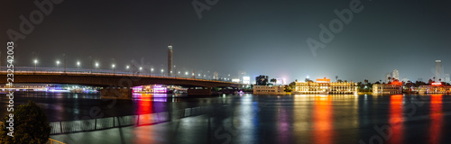 Panoramic of Cairo city center at night, long exposure with smoothed out water.
