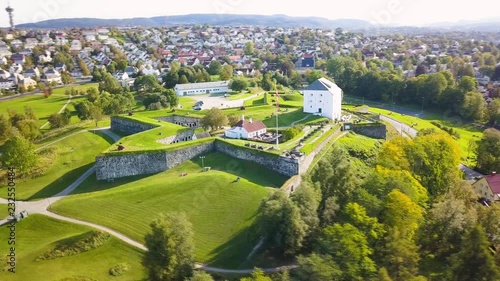 Aerial Capture of the Ancient Fortress in Trondheim, Norway - Sunny Summer Day with an overview of the city