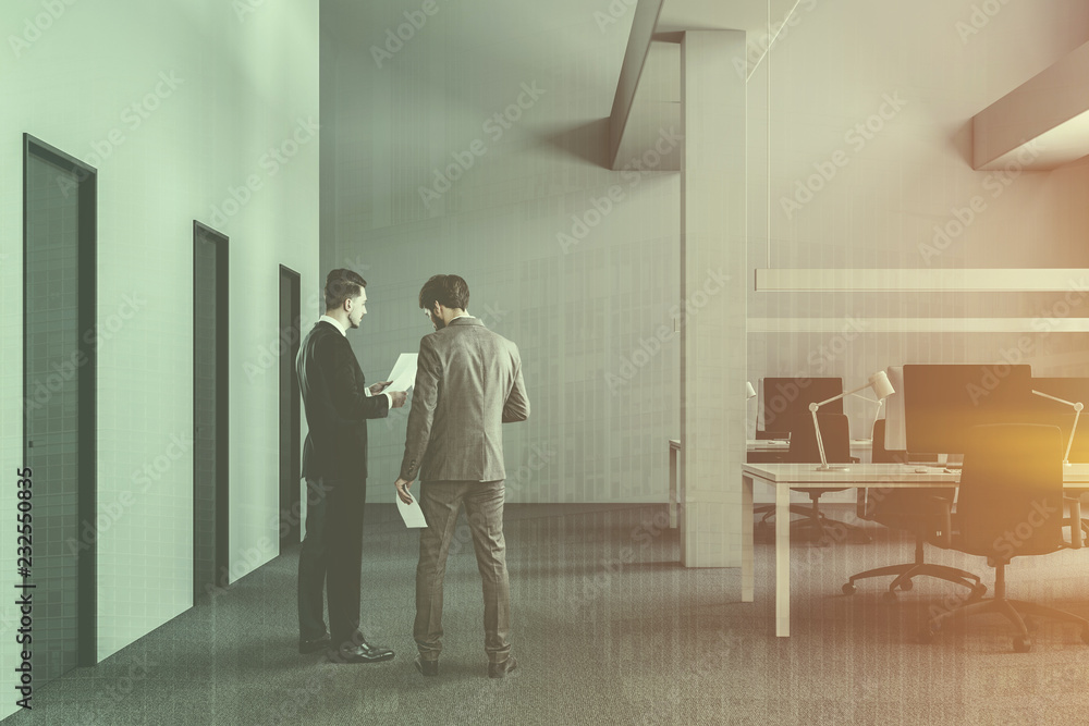 White industrial office with doors, people White industrial office with doors, people