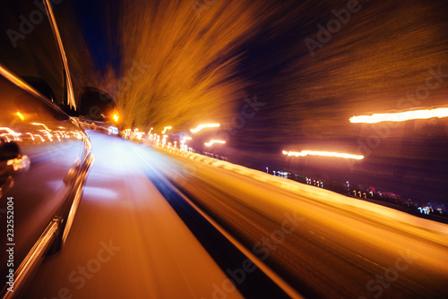 Car on the road with motion blur background.