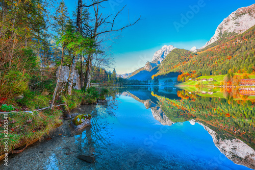 Fototapeta Naklejka Na Ścianę i Meble -  Fantastic autumn sunny day on Hintersee lake. Beautiful scene of mirror reflection in water