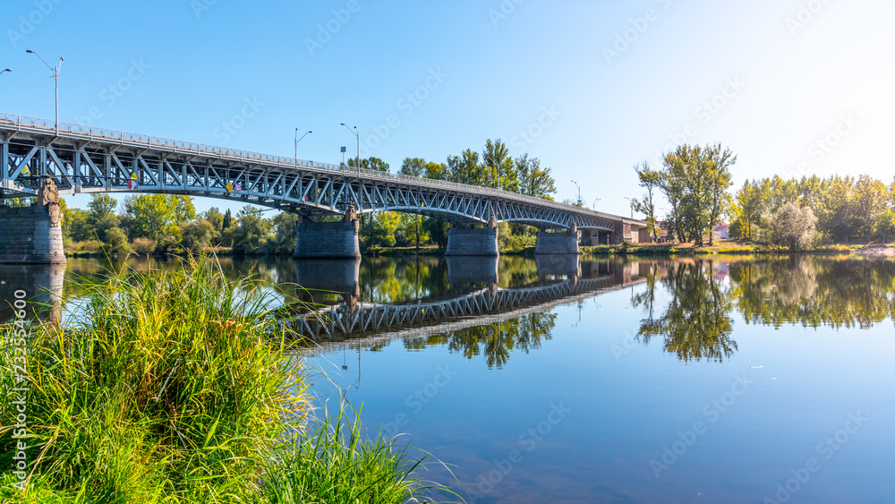 Tyrs Bridge over Labe River in Litomerice on sunny summer day, Czech Republic.