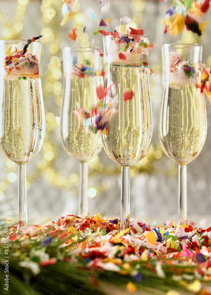 Champagne in Flutes with Confetti Stock Photo | Adobe Stock