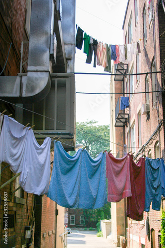 laundry lines in alley © Rob