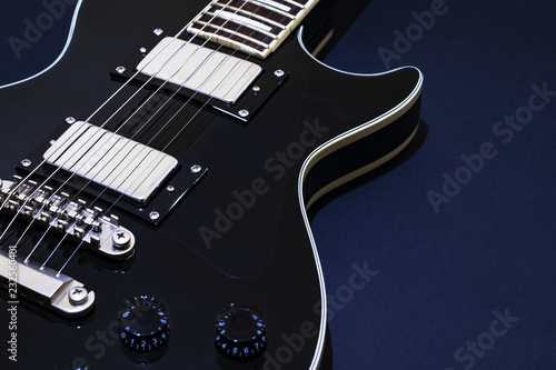 Sticker Black electric guitar for background, music studio