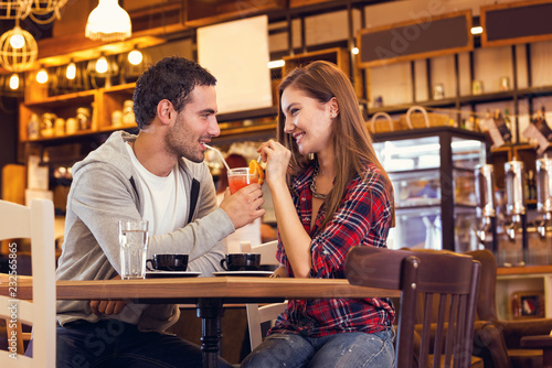 Man and woman dating at restaurant