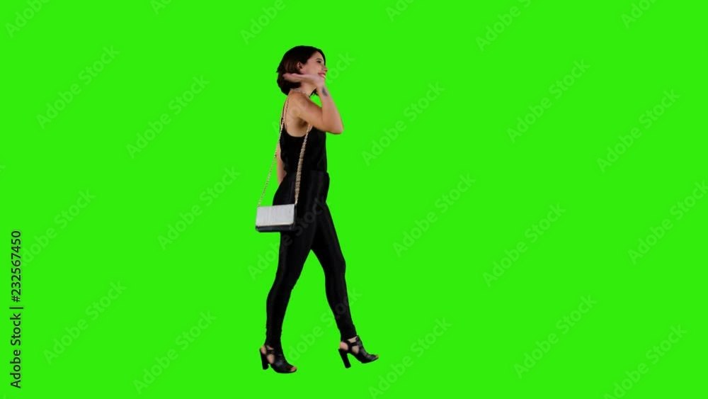 Pretty woman walking and laughing, a girls night out, over a green screen in a long side shot. Pretty woman walking and laughing, a girls night out, over a green screen in a long side shot.