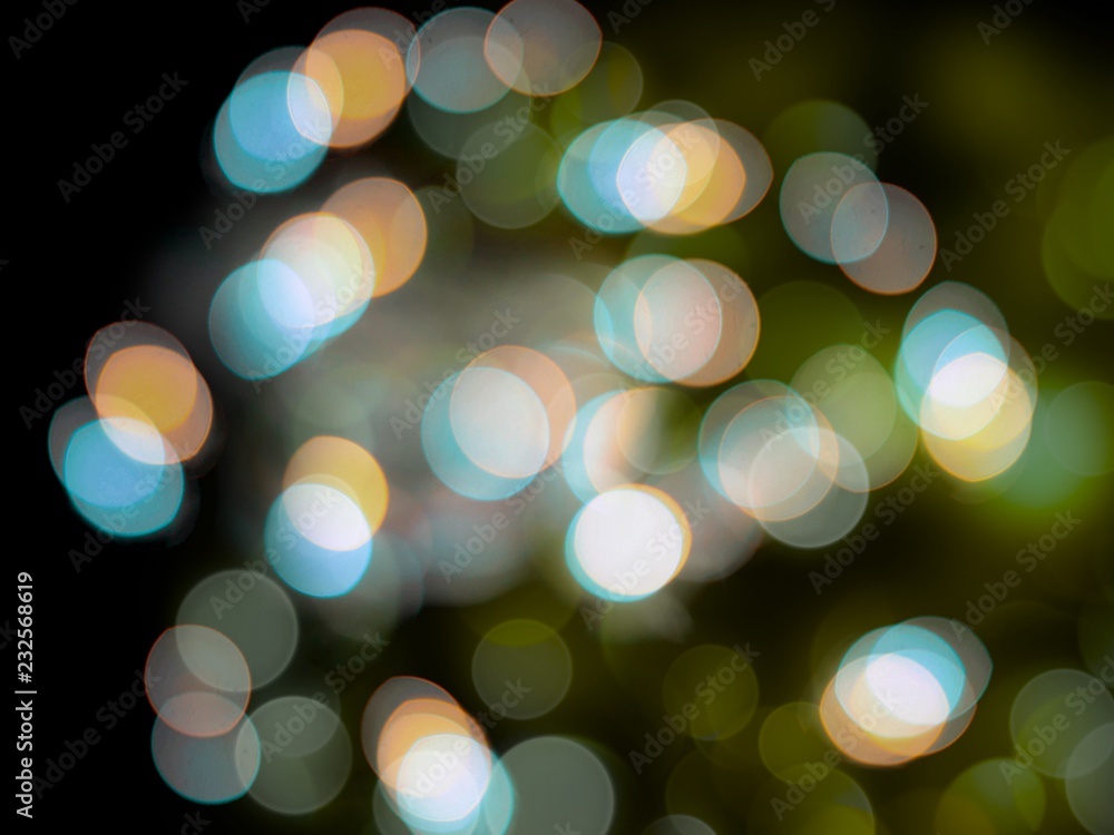 Obraz premium Soft glowing bright abstract white blue and orange lights blur background