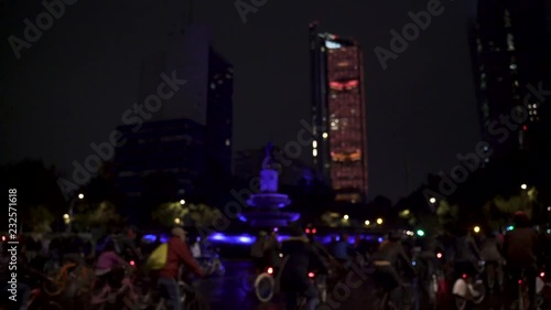 Dia de los muertos bicycle night ride in Mexico City at diana cazadora sculpture, people with customes on one of mexico most emblematic and important roads reforma photo