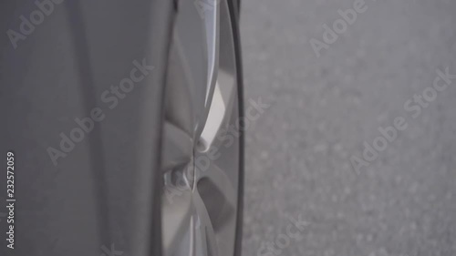 Closeup of a Car Rim while driving photo