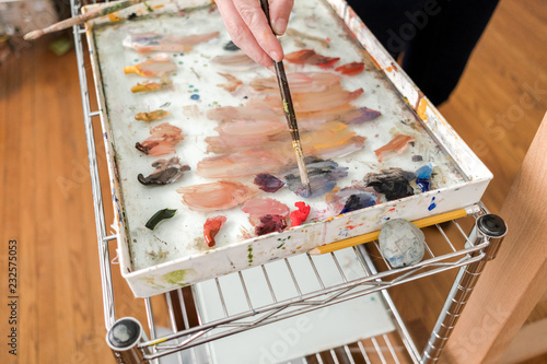 Woman painting in her studio photo