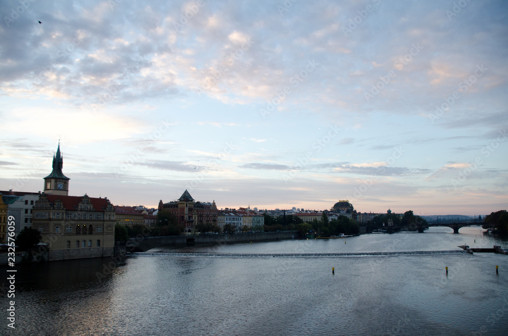 Watching sunrise on Vltava from Charles bridge