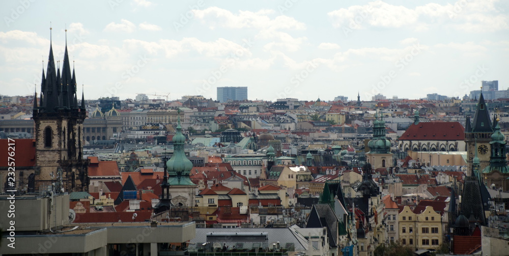 Looking at churches and towers of Prague Old town from Letna Park hill