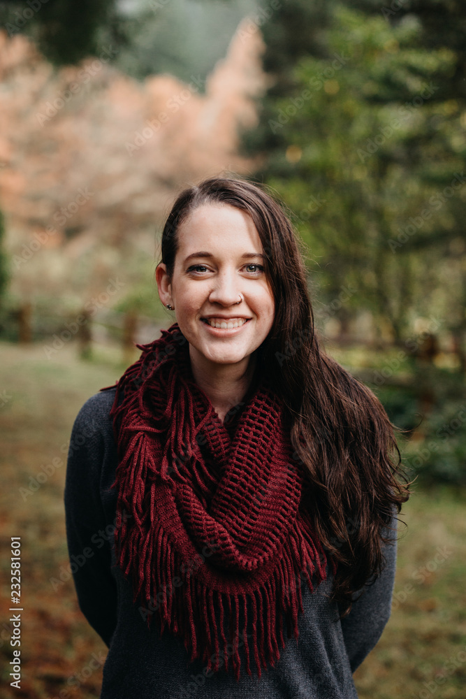 Portrait of Brunette Woman Smiling Wearing Scarf Portrait of Brunette Woman Smiling Wearing Scarf