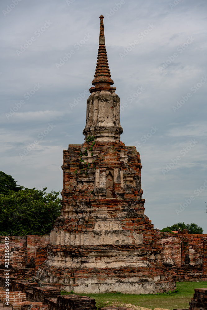 Fototapeta premium Ruined Pagoda at Wat Phra Mahathat, Ayutthaya histrorical park, Thailand