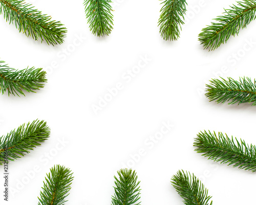 Christmas green framework with fir branches on white background. Top view