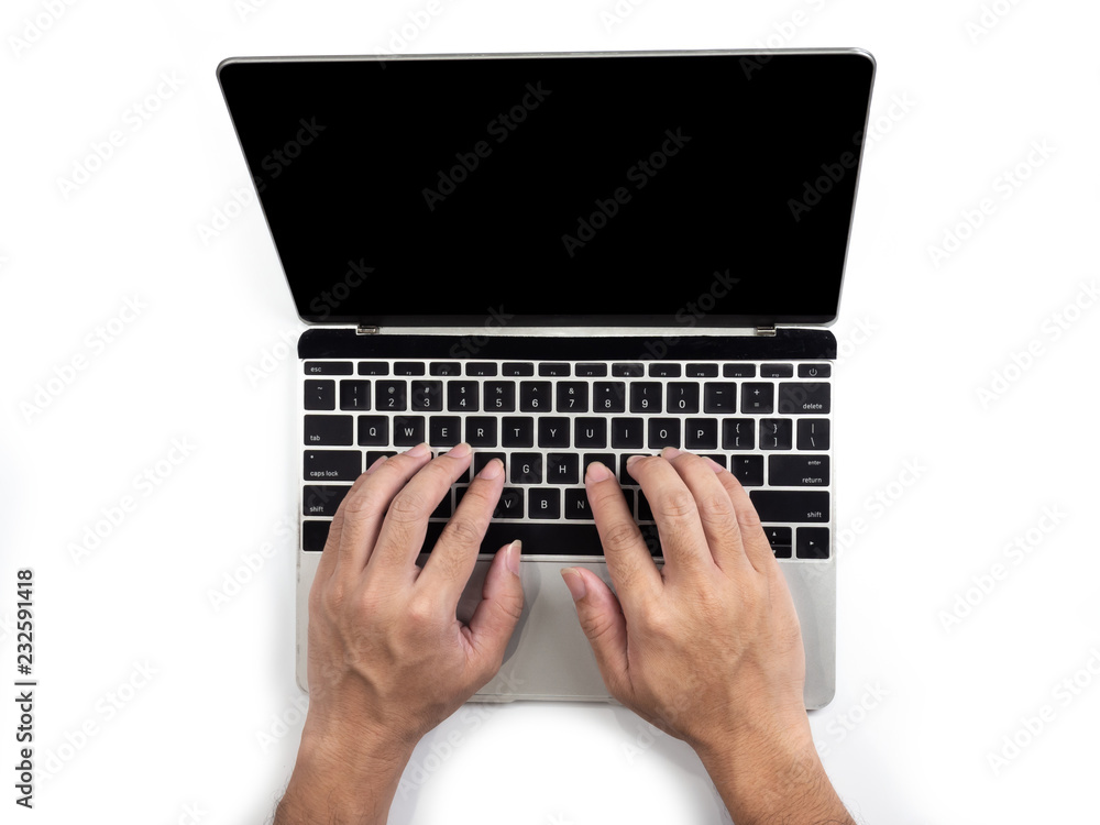 Fototapeta premium Top view of hands typing on computer laptop on white isolated background with clipping path.