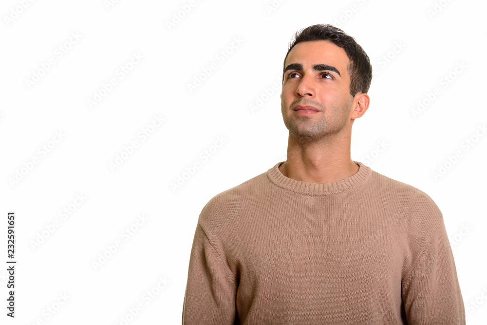 © Ranta Images - Portrait of young handsome Persian man thinking © Ranta Images - Portrait of young handsome Persian man thinking