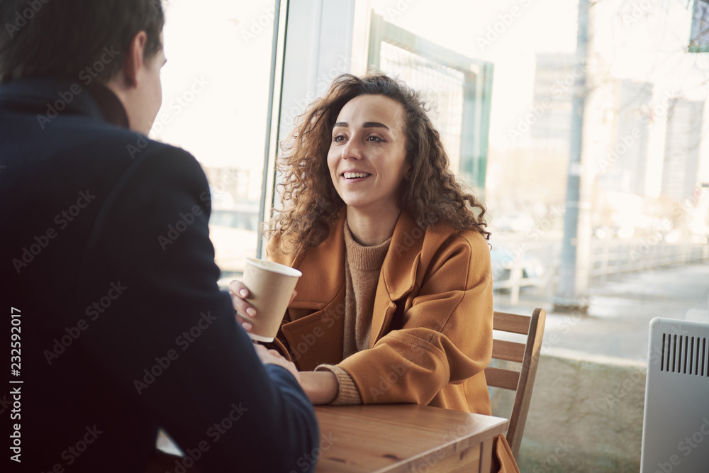 Amorous couple in coffee house Amorous couple in coffee house
