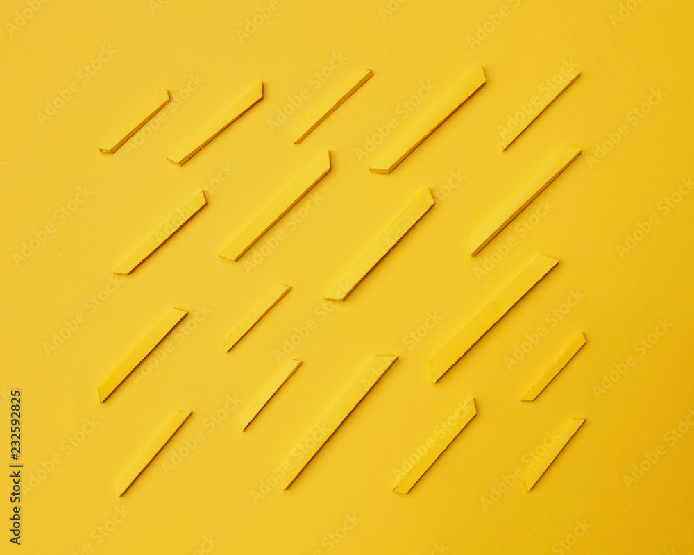 Paper craft french fries over yellow Paper craft french fries over yellow
