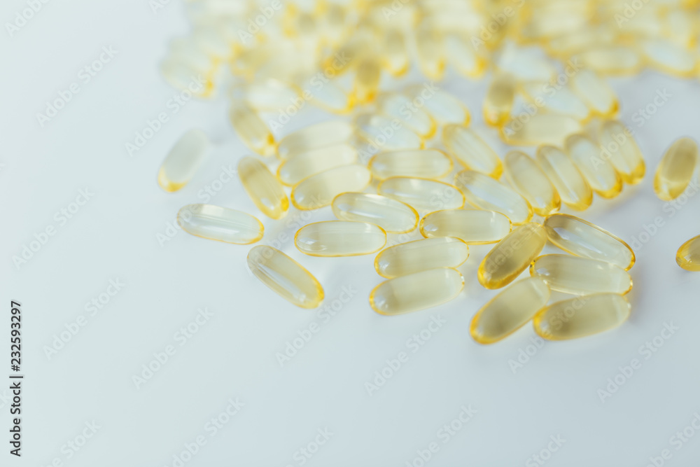 Close up of capsules Omega 3 on white background Close up of capsules Omega 3 on white background