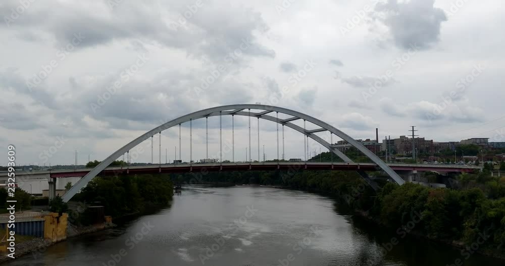 Cityscape suspension bridge over a river in Nashville, TN Cityscape suspension bridge over a river in Nashville, TN