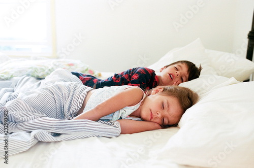 kids sleeping in bed